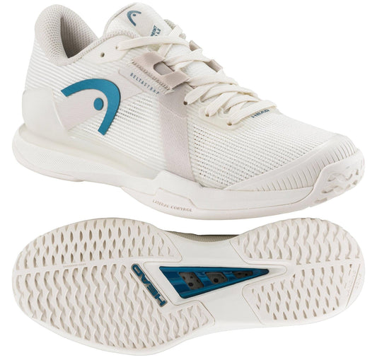 The HEAD Sprint Pro Women's Tennis Shoes in Chalk White and Twilight Blue feature breathable mesh uppers. One shoe is upright, showing the side view, while the other is flipped to display the patterned sole, emphasizing their lightweight comfort.