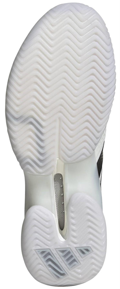 The image shows the white, textured sole of the adidas ADIDAS Barricade 14 Mens Tennis Shoes - White, featuring a herringbone tread and transparent sections, captured from the bottom view.