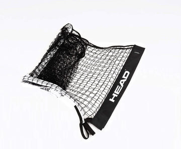The HEAD 10 and Under Replacement Tennis Net - 6.1m, featuring a black and white zigzag pattern and edges, is seen partially folded on a white surface. This durable net, ideal for young players, ensures quality for 10 and Under Tennis games.