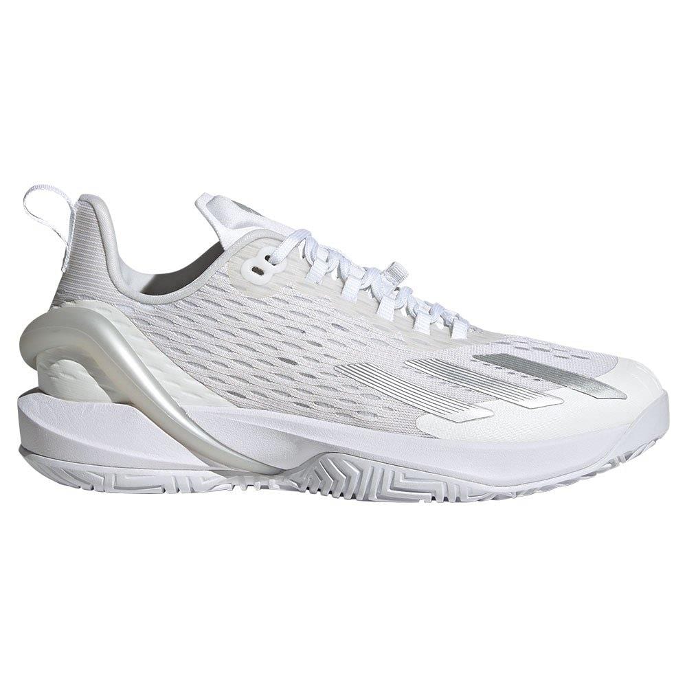 Crafted to enhance swift motion, the adidas Adizero Cybersonic Women's Tennis Shoes in White/Silver offer a sleek design. They include a mesh upper, cushioned heel, textured rubber sole, pull tab at the heel, and traditional white laces.