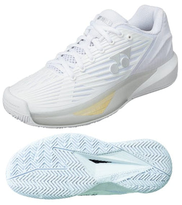 Introducing the Yonex Power Cushion Eclipsion 5 Women's Tennis Shoes in white, featuring a sleek athletic design with a textured side and signature logo near the heel. The sole showcases advanced Feather Bounce Foam technology, highlighted separately to emphasize its zigzag tread pattern for superior grip. Ideal as all-court tennis shoes for women, these offer exceptional comfort and performance on any surface.