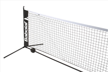 Ideal for children's tennis practice, the Babolat Mini Tennis Net boasts a sophisticated black and white design accented by the "Babolat" branding on its side. Its robust metal frame ensures durability and portability, making it perfect for use against a plain white backdrop or any location of your choice.