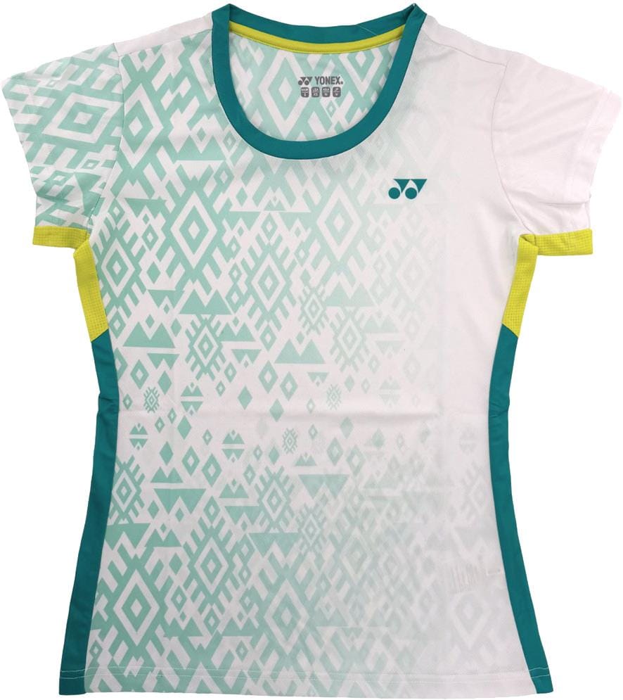 The Yonex YTL11 Womens Tennis T-Shirt in white features a geometric teal and white design, teal side panels, yellow sleeve accents, and is made from quick-drying, lightweight performance fabric for on-court comfort.