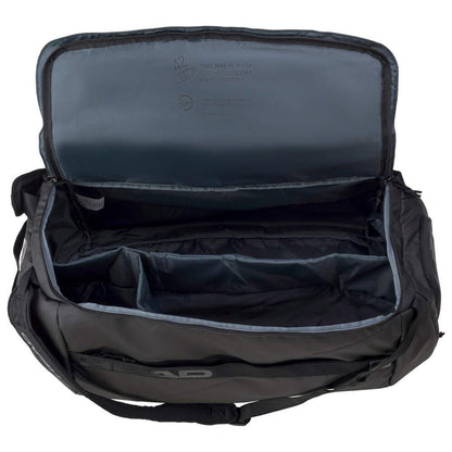The HEAD Pro X Tennis Duffle Bag L - Black by HEAD includes several compartments and a roomy, lined interior crafted from recycled PET bottles. Equipped with a zipper closure, shoulder strap, durable handles, and CCT+ climate control technology, this empty bag is ideal for any tennis enthusiast.
