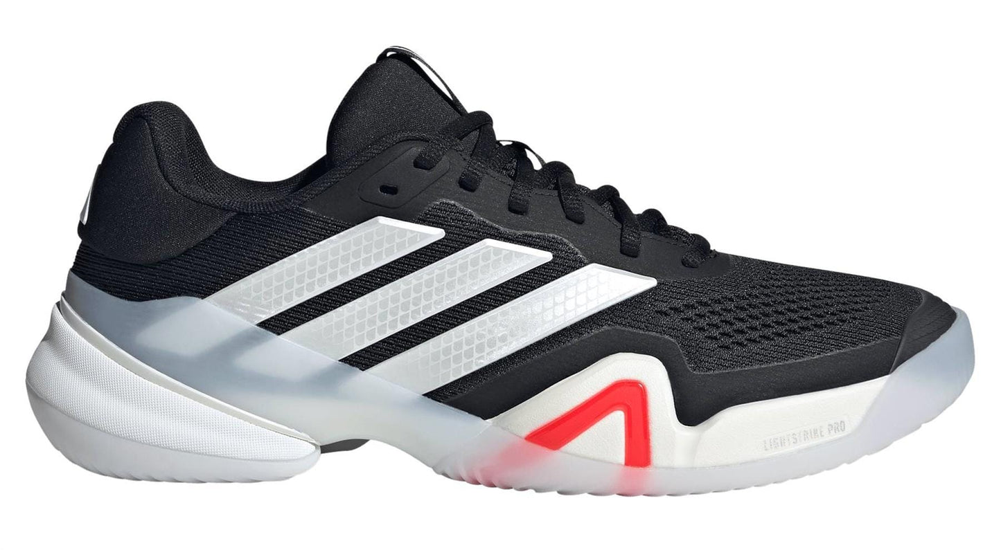 The ADIDAS Barricade 14 Men's Tennis Shoes in black by adidas feature white stripes, a mesh upper for breathability, red midsole accents, and a white translucent sole—ideal court shoes for performance and style.