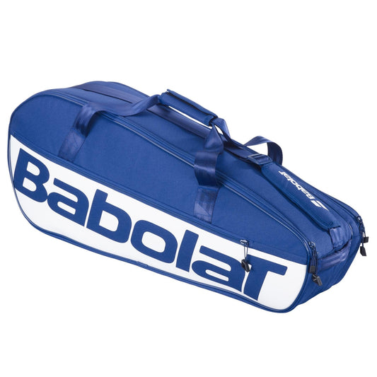 The Babolat Court M 6 Racket Tennis Bag - Dark Blue by Babolat features handles, zippers, a large side logo, and is made from recycled PET to carry rackets and gear.