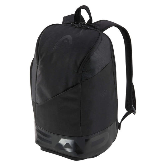Introducing the HEAD Pro X Legend 28L Tennis Backpack - Black: a chic backpack with a minimalist design, showcasing a subtle logo on the upper front and bold text on the base. This environmentally friendly accessory includes a padded racquet compartment, top handle, and two shoulder straps crafted from textured material.