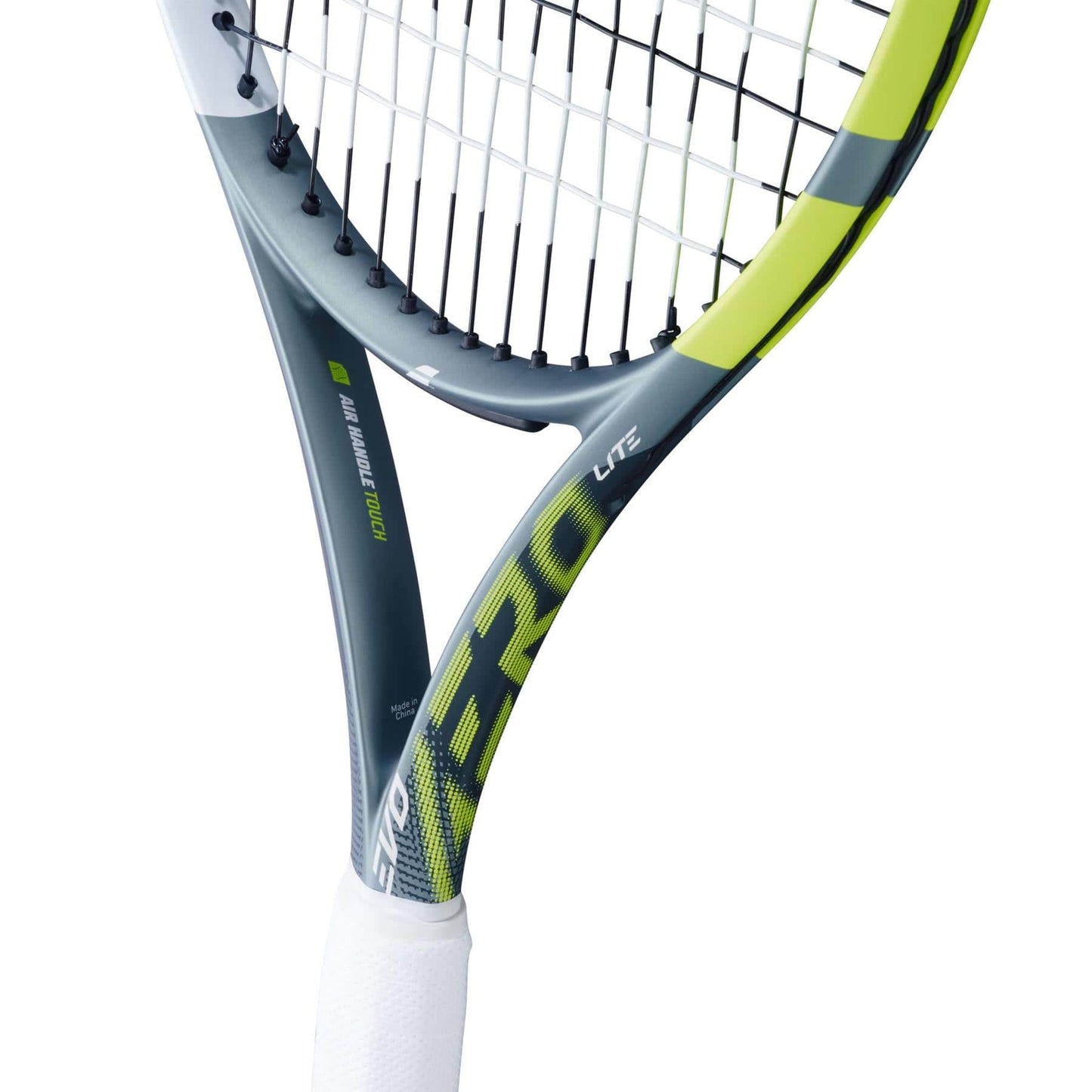 Close-up of the Babolat Evo Aero Lite 2026 Tennis Racket by Babolat, featuring a gray and yellow frame, black and white strings, a white grip, and "AERO" in yellow on the shaft of this lightweight racket.