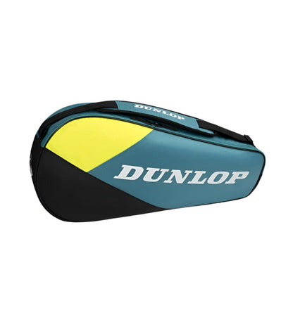 The Dunlop SX Club 3 Racket Tennis Bag in teal, black, and yellow boasts prominent white "Dunlop" lettering. Featuring a lightweight design, it includes padded backpack straps for easy carrying and secure zippered closure.