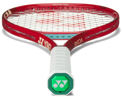 The Yonex VCORE 98 Tour Ruby Red 2026 tennis racket features a red frame, white strings, and a white grip, shown from the handle end facing forward with the head angled upward—ideal for players seeking maximum spin.