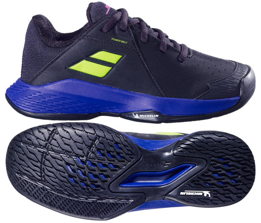 The Babolat Propulse Junior 3 Boys Tennis Shoes in Black/Dark Blue feature blue and lime accents, a textured Michelin-branded sole, perforations for breathability, and a low-cut design, shown from the side and bottom.