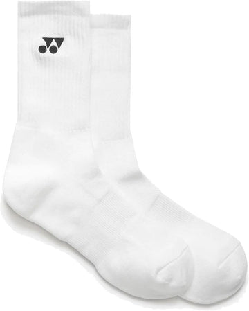 The Yonex 19256EX Sport Crew Tennis Socks - White (3 Pack) are plain, moisture-wicking crew socks with ribbed cuffs and a small black Yonex logo near the top, shown laid flat side by side on a white background.