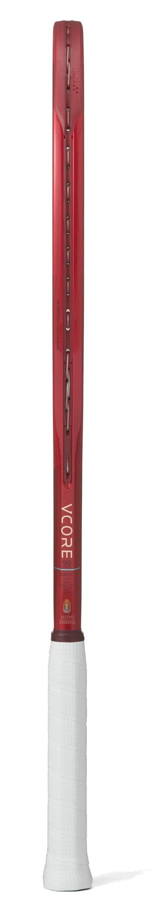 Side view of the Yonex VCORE 98 Tour Ruby Red 2026 Tennis Racket with a white grip, showcasing its thin frame profile engineered by Yonex for maximum spin.