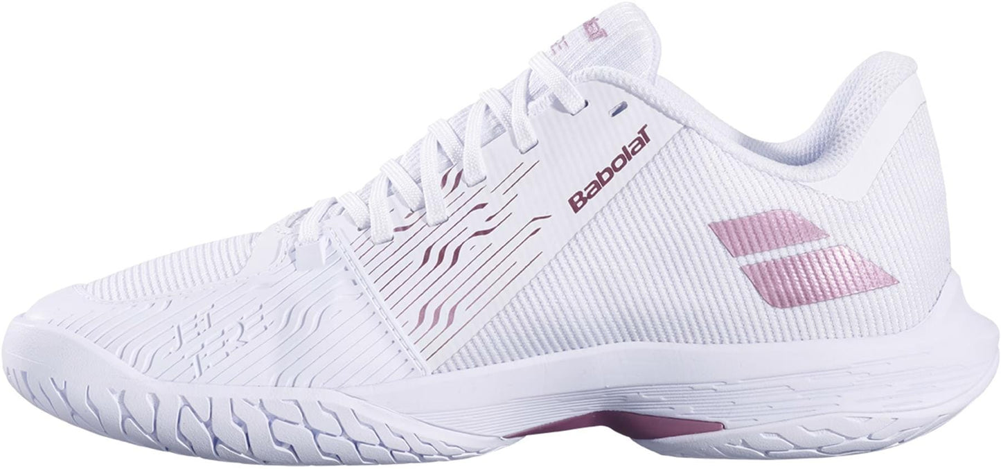 The Babolat Jet Tere 2 All Court Women's Tennis Shoes in White/Golden Pink offer a comfortable, ultra-lightweight feel, a breathable mesh design, golden pink accents, and a textured rubber sole for excellent grip.