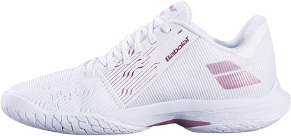 The Babolat Jet Tere 2 All Court Women's Tennis Shoes in White/Golden Pink offer a comfortable, ultra-lightweight feel, a breathable mesh design, golden pink accents, and a textured rubber sole for excellent grip.