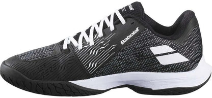 Side view of the Babolat Jet Tere 2 All Court Men's Tennis Shoe in black and white, featuring white laces, a textured sole, wave patterns, and the Babolat logo on the side.
