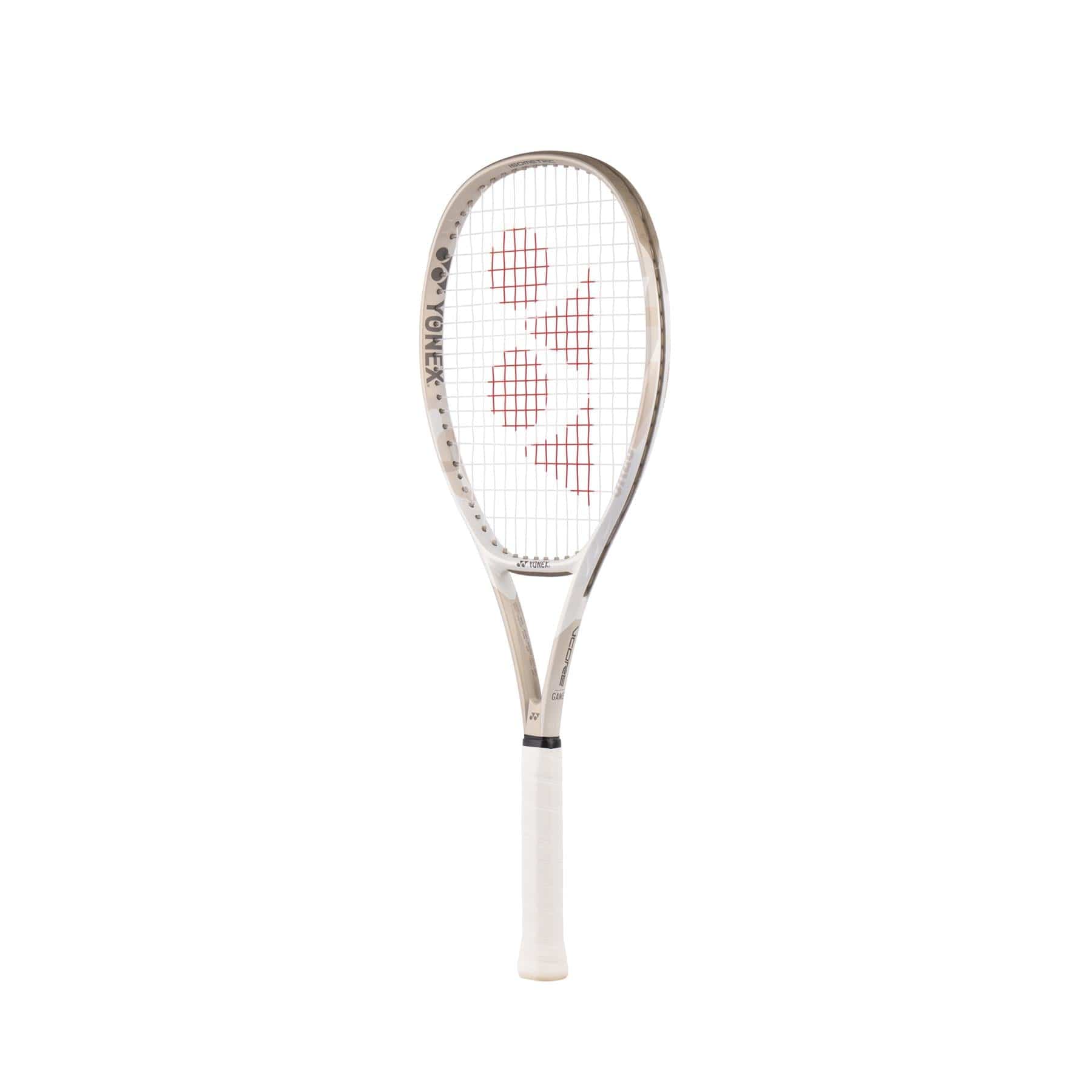 A sand beige Yonex VCORE Game Tennis Racket, inspired by ISOMETRIC™ design principles, displays a striking red logo on the strings and a black handle. It stands upright against a plain white background, echoing precision in its design.