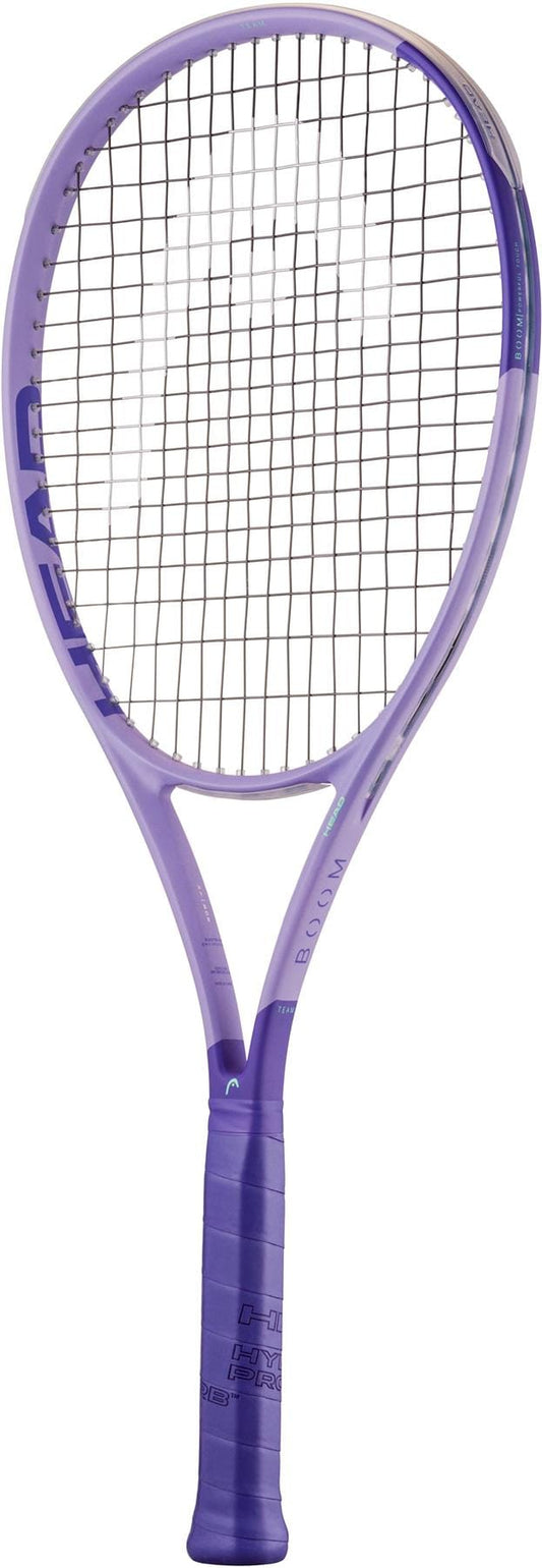 The HEAD Boom Team Alternate 2026 Tennis Racket by HEAD is a purple beginner's racket with black strings and a wrapped grip, designed for extra power, shown vertically (handle down, head up) on a plain white background.