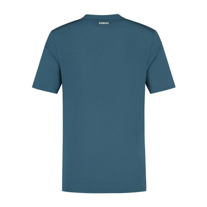 An Indian Teal K-Swiss Hypercourt Basic Crew Men's Tennis T-Shirt is displayed from the back. The fabric looks soft and smooth, with "K-SWISS" printed in white near the neckline at the top center.