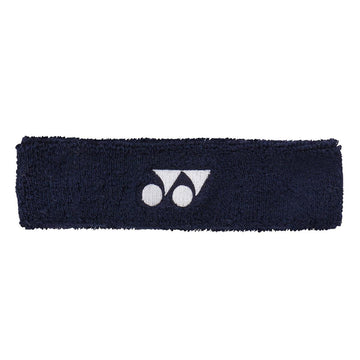 The Yonex AC259 Headband in navy blue showcases a white logo with twin circles and a stylized "Y" at the center. Crafted from sweat-absorbing, anti-bacterial materials, it ensures you stay cool and comfortable during intense workouts.