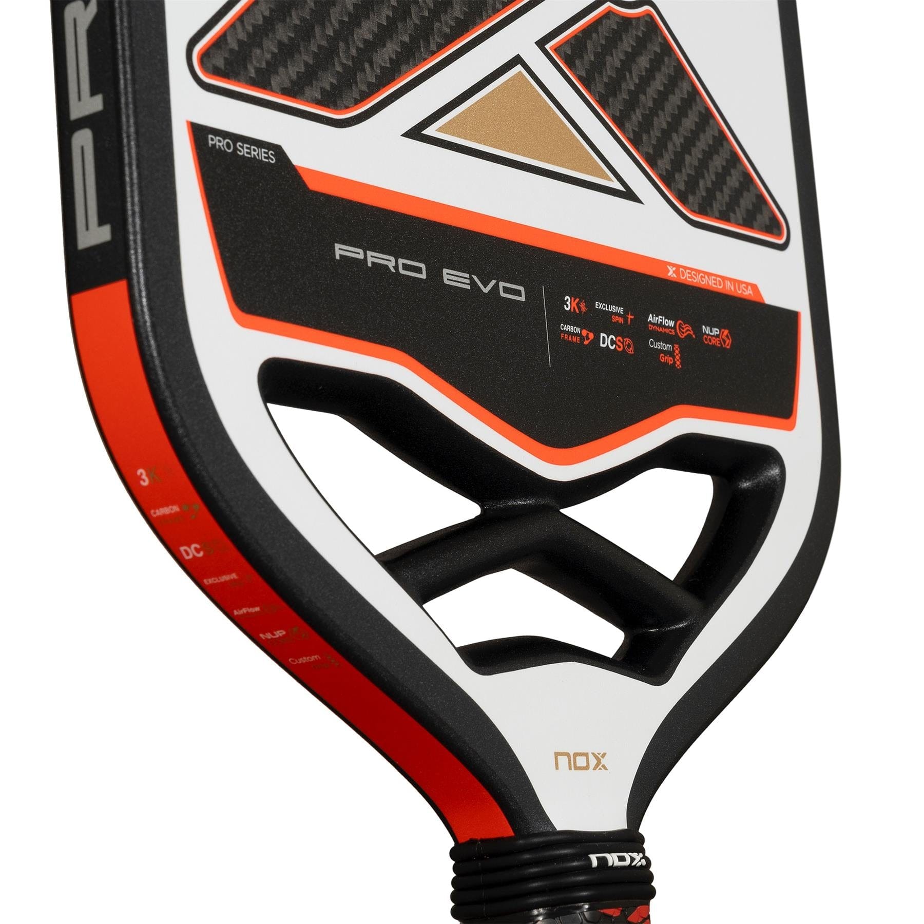 Close-up of the NOX Pro Evo Pickleball Paddle by NOX in black and red, showing its carbon fiber detail, Ultra Power Core for increased power, and specs printed near the handle.