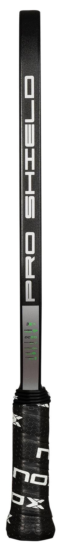 A close-up of the NOX NOV Pro Shield Pickleball Paddle in black and green highlights its bold white branding, black and white grip at the base, and durable carbon fibre construction.