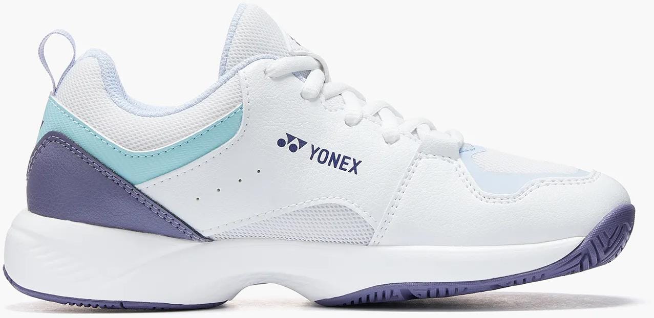 The Yonex Pro-Move Classic Junior Tennis Shoes in White/Sax feature light blue accents, breathable mesh panels, a textured sole, lace-up design with Yonex logo, and Power Cushion Technology for superior comfort.