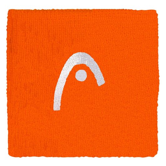 The HEAD 2.5" Tennis Wristband in orange features a white embroidered arc and dot logo, offering both comfort and style on the court—ideal as a sweatband for tennis players.