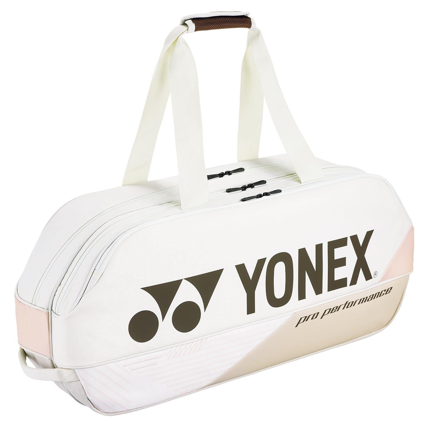 The Yonex 92431WEX Pro Tournament 6 Racket Tennis Bag in sand beige includes dual handles and a zippered compartment. The Yonex logo is prominently displayed on the side, making it ideal for any pro tournament.
