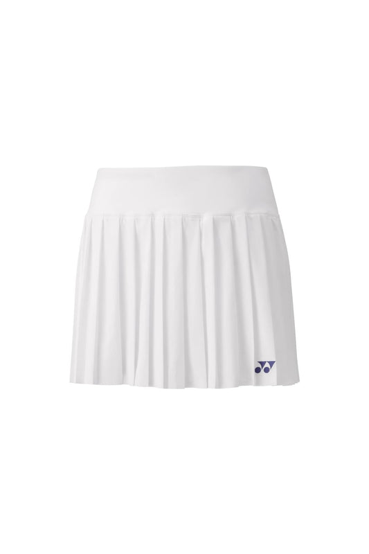 The Yonex 26123 Women's Tennis Skirt in white is a pleated skirt perfect for tennis, subtly displaying the brand's logo on the lower right. Made with Xylitol cooling material, this skirt is designed for peak performance during tournaments, presenting a clean and classic look that highlights simplicity and elegance.