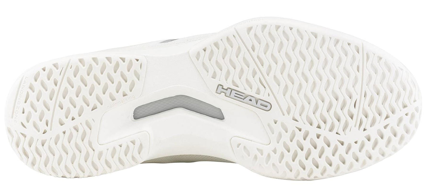 The image displays the white sole of the HEAD Sprint Team 4.0 Womens Tennis Shoes in Chalk White/Light Grey, featuring a herringbone-style tread and "HEAD" embossed at the center, emphasizing its lightweight design.