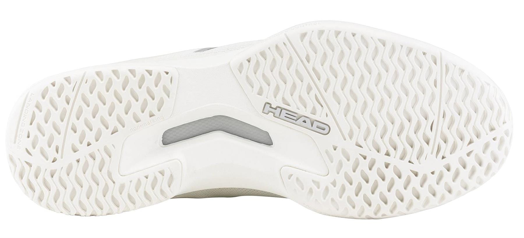 The image displays the white sole of the HEAD Sprint Team 4.0 Womens Tennis Shoes in Chalk White/Light Grey, featuring a herringbone-style tread and "HEAD" embossed at the center, emphasizing its lightweight design.
