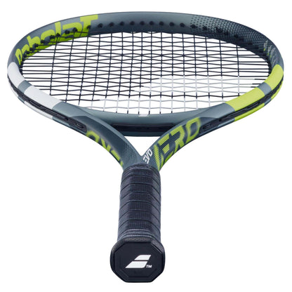 A close-up of the Babolat Evo Aero 2026 Tennis Racket by Babolat, featuring a black grip and a black-and-yellow frame with tight strings, viewed from handle to head against a white background—ideal for intermediate to advanced players.