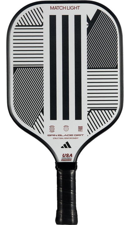 The adidas Match Light 3.3 Pickleball Paddle - White features a black handle, white face with bold black geometric lines, "MATCH LIGHT" at the top, and "USA PICKLEBALL APPROVED" at the bottom—ideal for beginner-level players.