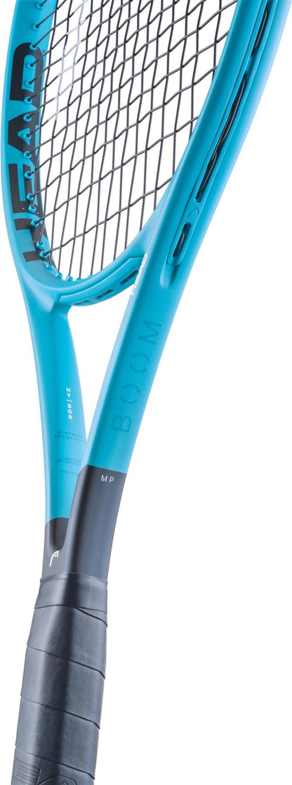 Close-up of the HEAD Boom MP 2026 Tennis Racket, featuring its blue frame, strings, and black grip with “BOOM MP” on the shaft—demonstrating the explosive power offered by HEAD’s latest performance racket.