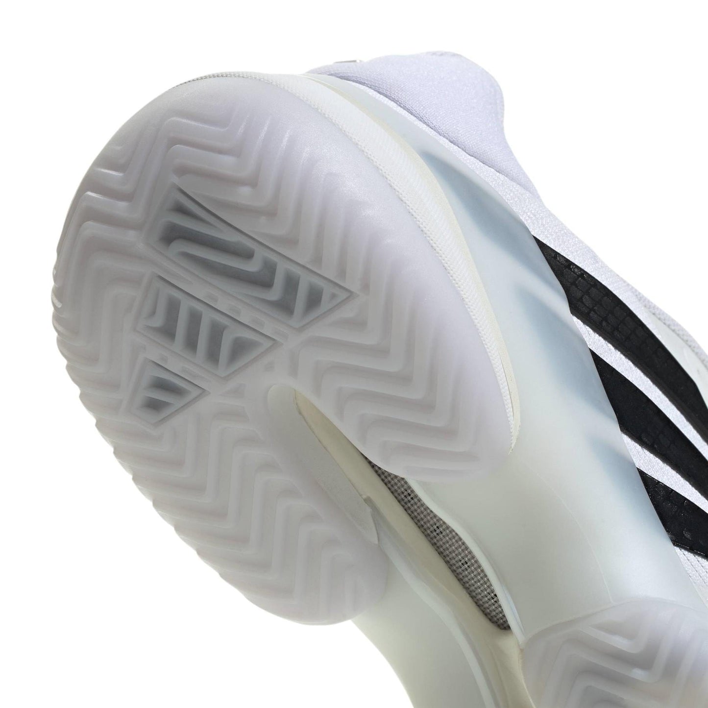 Close-up of the sole on adidas Barricade 14 Mens Tennis Shoes - White, highlighting the translucent, textured rubber outsole and herringbone tread for superior traction on court.
