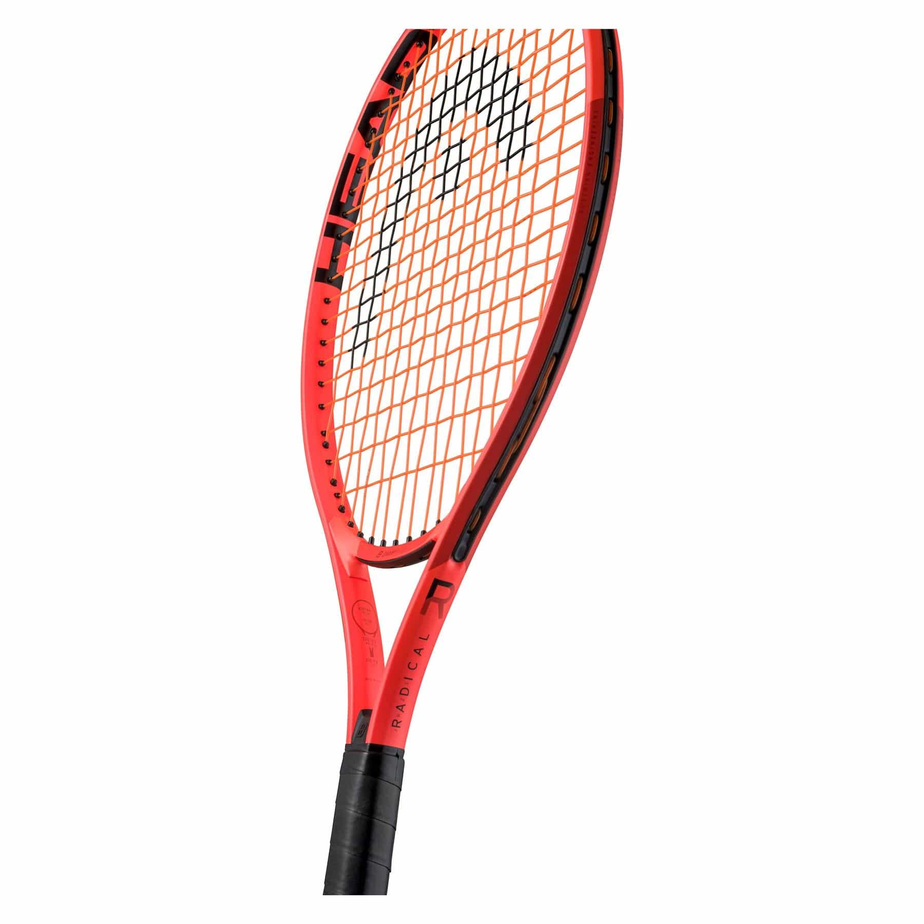 A close-up of the HEAD Radical Junior 23 2025 Tennis Racket in vibrant orange with black accents features a geometric string pattern and a Damp+ insert. Branding details adorn the shaft, with a black grip wrapped over it, all set against a white background.