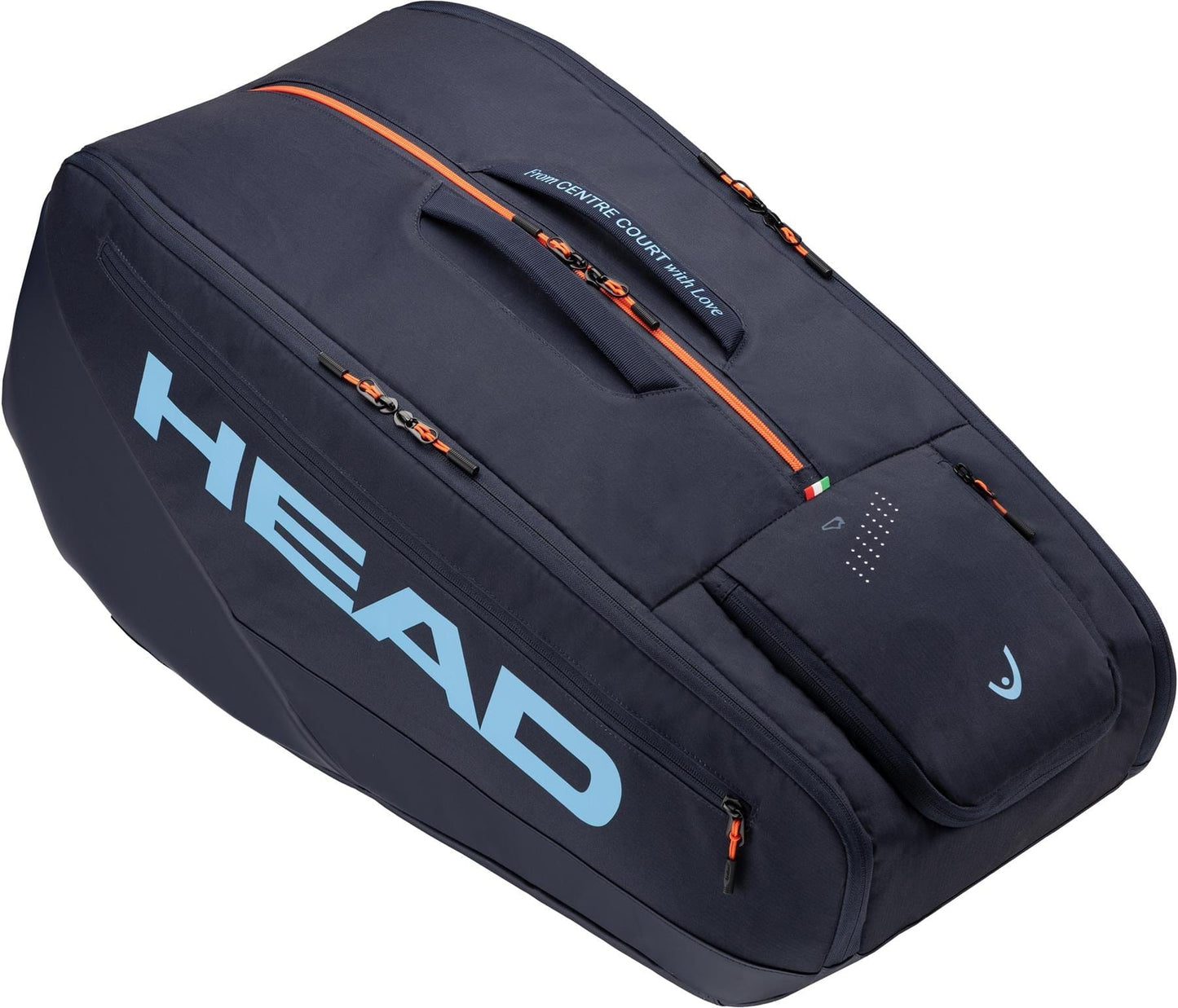 The HEAD Pro 12 Racket Tennis Bag XL - Navy features blue branding, multiple orange-accented zippers, and a top handle—ideal for carrying rackets and gear at tournament level.