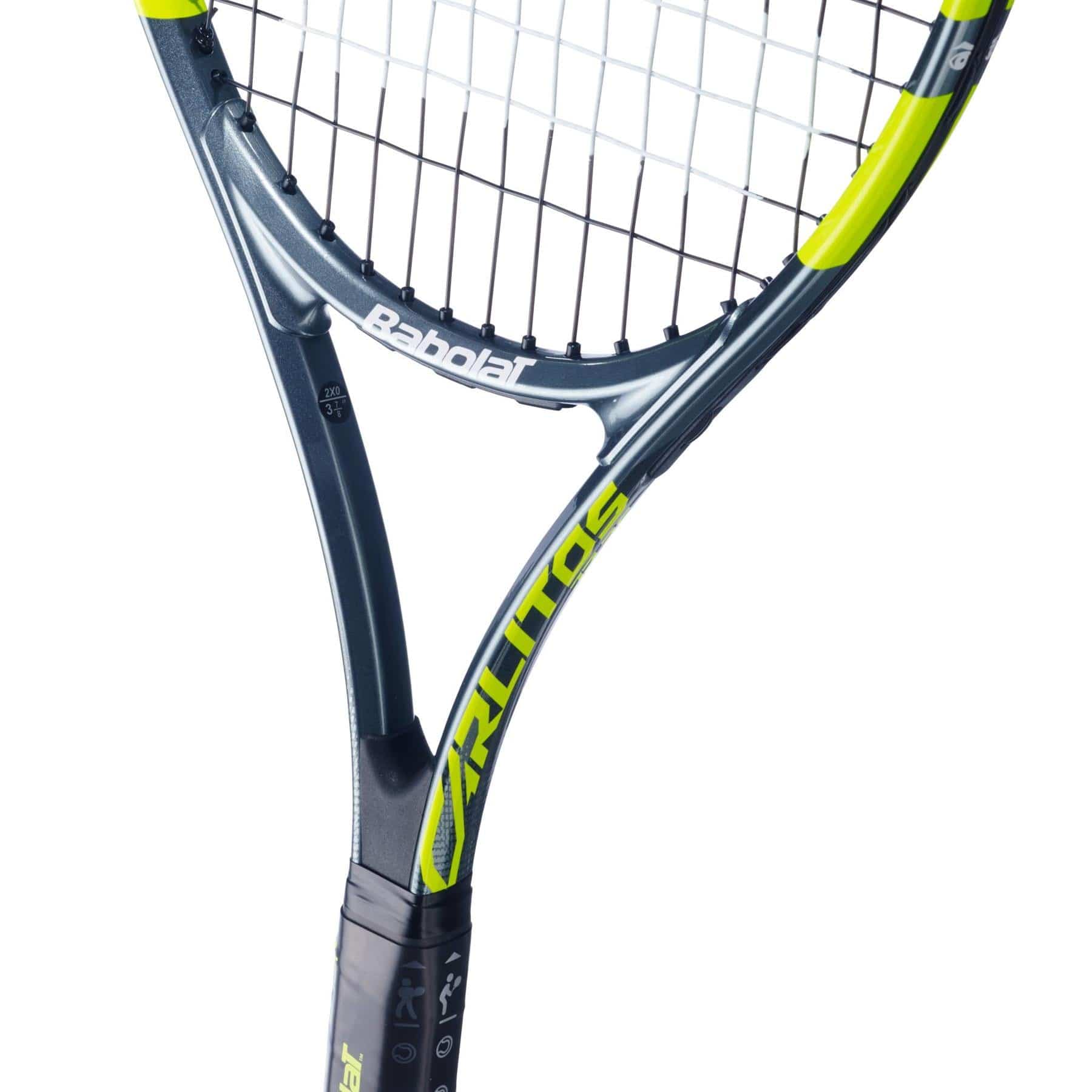 Close-up of the Babolat Carlitos Junior 26 Tennis Racket by Babolat, featuring a black and yellow frame, white strings, and "PULS DRIVE" on the side, displayed against a plain white background.
