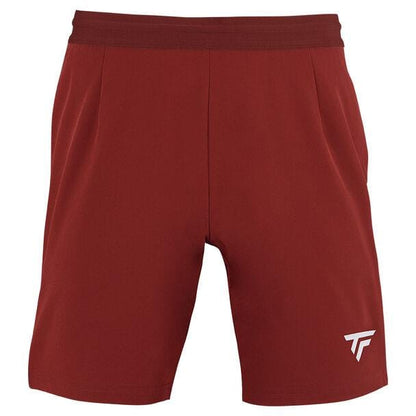 Introducing the Tecnifibre Men's Team Tennis Short in cardinal, these athletic shorts include an elastic waistband for maximum comfort and a small white logo on the lower left. Designed with simplicity, they also offer enhanced ventilation to keep you cool during intense workouts.