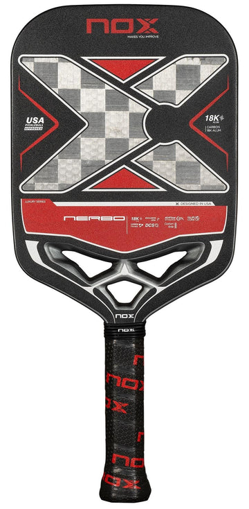 The NOX Luxury Nerbo Pickleball Paddle features a carbon fibre build with a black, red, and gray design, a large X pattern, checkered texture, and a handle wrapped in black grip tape with red "NOX" logos.