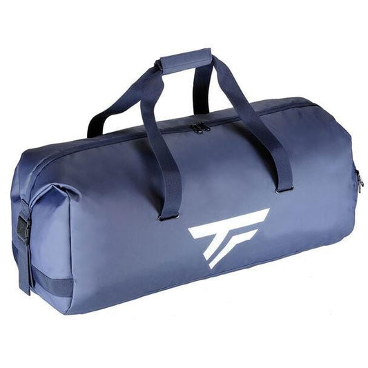 The Tecnifibre Tour Endurance 2023 Tennis Rackpack is a spacious navy blue bag from the renowned brand Tecnifibre, featuring a sleek design with black straps and a prominent white geometric logo. Its roomy interior and zipper closure make it ideal for travel or gym activities, particularly for enthusiasts of racket sports.