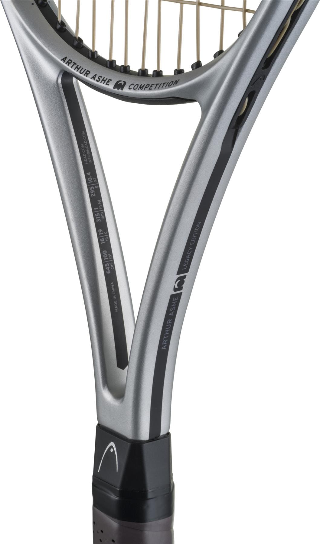 Close-up of the HEAD Arthur Ashe Competition 2025 Tennis Racket - Silver, highlighting the branded throat, visible strings, and part of the black handle grip.