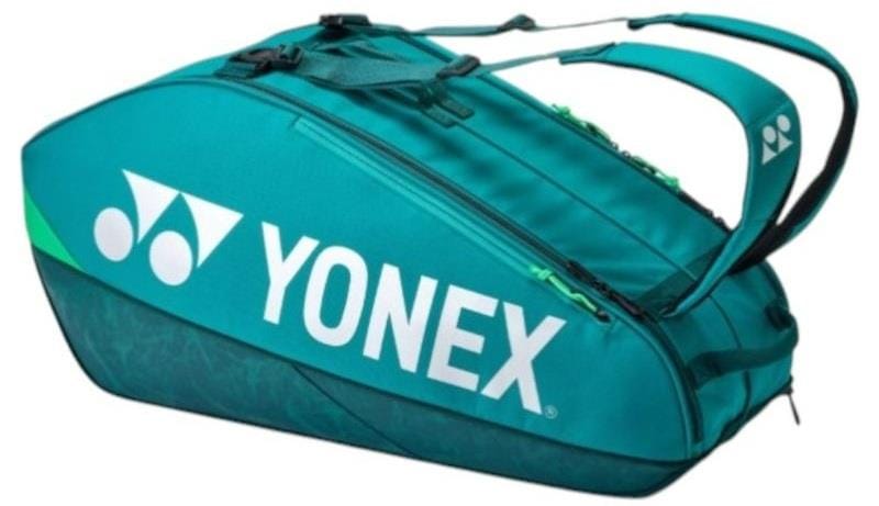 The Yonex 92426EX 6 Racket Pro Tennis Bag in dark green features multiple zippers, padded shoulder straps, and a white Yonex logo—perfect for carrying sports gear like badminton or tennis rackets.