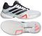 The adidas Barricade 14 Mens WIDE Tennis Shoes in white feature black stripes, a black heel, pink accents, and a herringbone sole with translucent sections—shown from side and sole views—ideal for tennis courts.