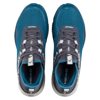 Top view of HEAD Motion Pro Mens Pickleball Shoes (TBWH) in blue and gray with white laces, breathable mesh, and HEAD branding visible on the tongues and sides.