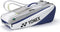 The Yonex BA52526EX Club 6 Racket Tennis Bag in white/blue features a large Yonex logo, zippered side pocket, and gray shoulder straps—ideal for carrying tennis or badminton gear.