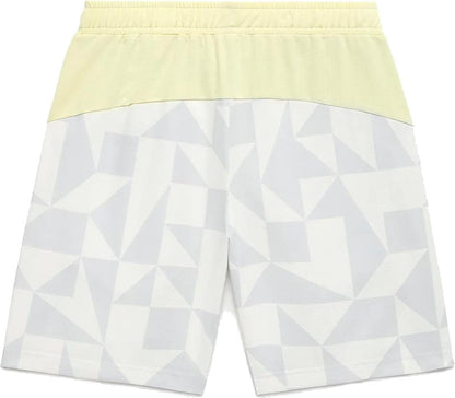 Back view of Yonex 15240YX Knit Men's Tennis Shorts in Champagne, featuring a geometric light gray and white pattern, solid light yellow waistband, and breathable knit fabric.