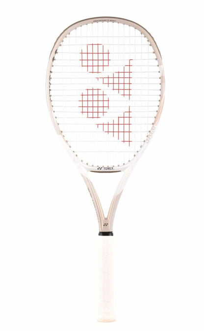 The Yonex VCORE Feel Tennis Racket in Sand Beige features a red logo on the strings, a white handle, and "Yonex" branding. Displayed on a plain white background, this racket utilizes ISOMETRIC technology for better precision and control.