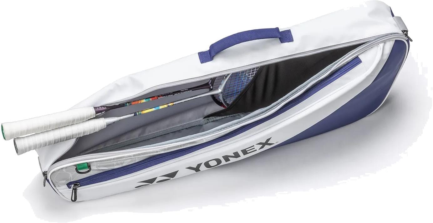 The Yonex BA52523EX Club 3 Racket Tennis Bag in white and blue is unzipped to reveal two racquets with white handles inside. Lightweight and easy to carry, this Yonex bag features a convenient top handle for transport.